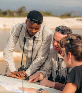 Tanzania safari guide and guests