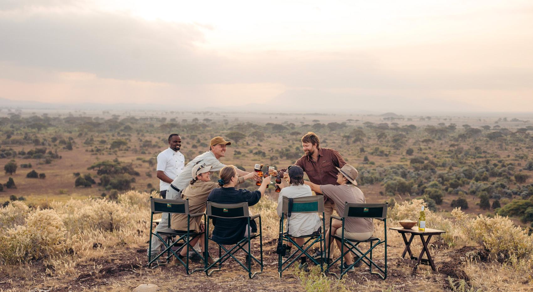 Guests having sundowners in West Kilimanjaro. Guests having sundowners in West Kilimanjaro.