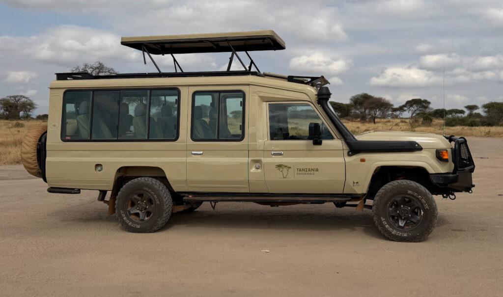 Tanzania-Experience safari vehicle with pop-up roof