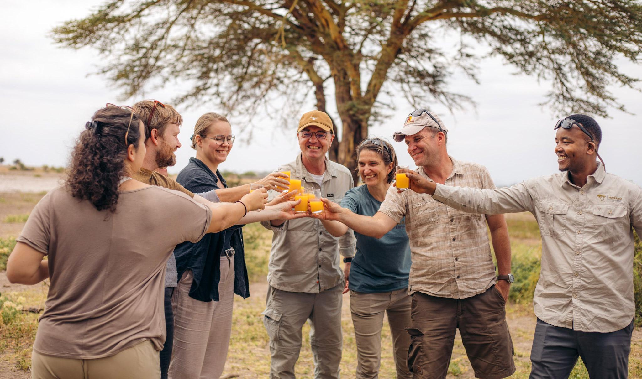 A group of travel experts saying cheers.